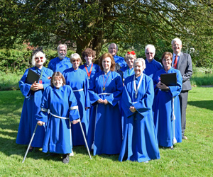  All Saints Warlingham choir singing at the consecration of the new burial gound